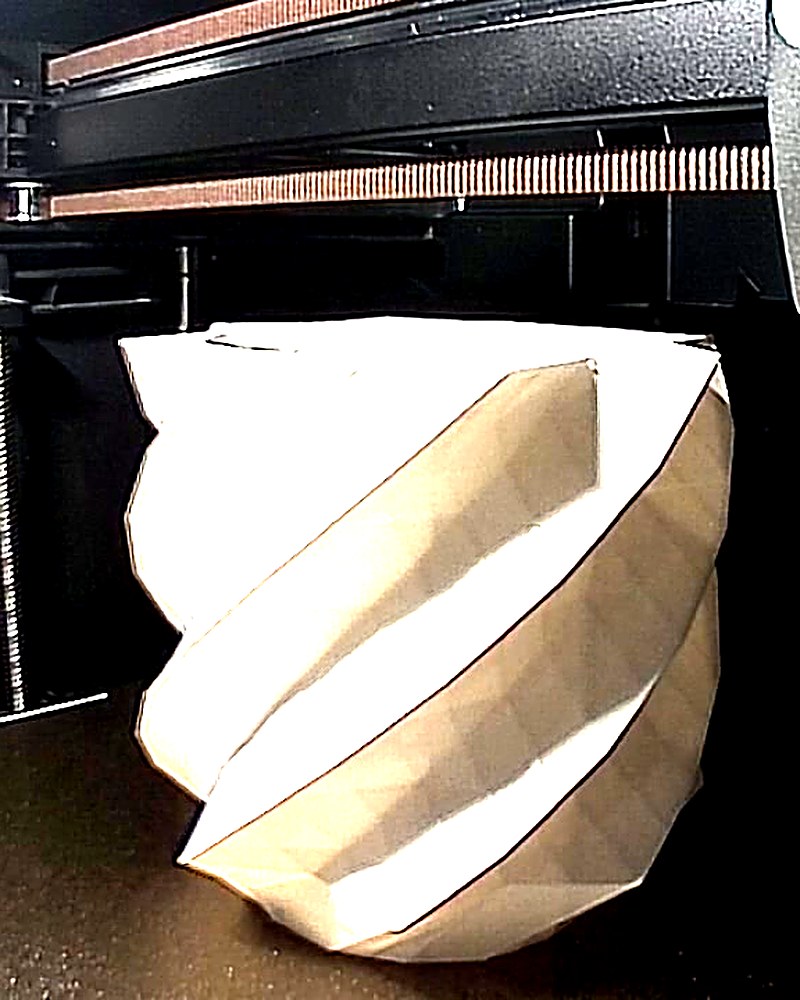 The finished vase still sitting on the build plate.